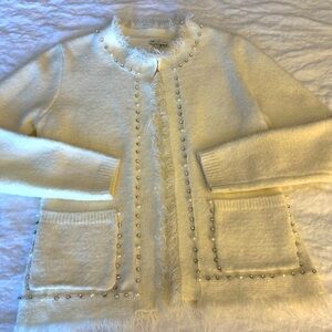 Unconstructed knitted ivory fringed and embellished blazer. Excellent condition.